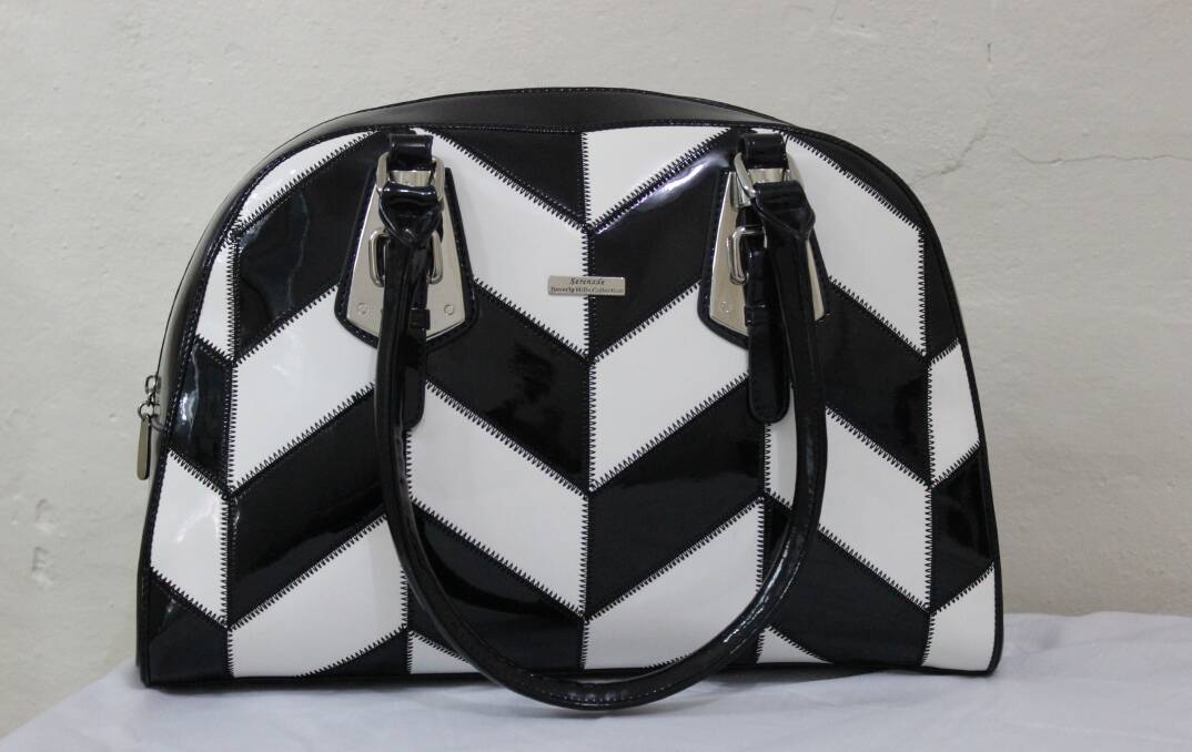 Black and white pieces, like this handbag from Eves Lithgow, are versatile and will match anything in the wardrobe (call 63514444). And don't forget; two lucky mums will win these prizes!