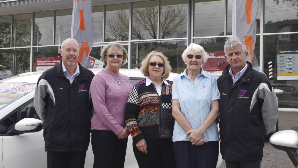 Kia sponsors Todd Nyitrai (left) and Paul Currey with champions Sue Brooks, (A grade), Di McGuire (B grade) and Anne Doohan (C grade).