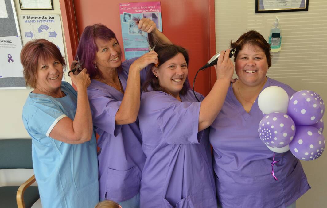 Lithgow Hospital nurses Narelle Marjoram, Chris Peachman, R'Echele Mjadwesch and Virgina Smith are set to shed their crowning glory in a purple haze to support a workmate through a trying time.