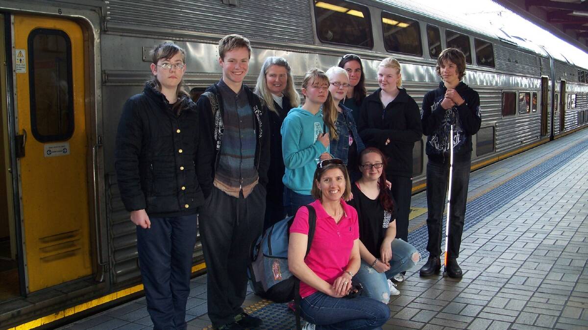 THE CENTRAL WEST TEAM ARRIVING AT CENTRAL STATION: From left are Christopher King (Lithgow High), Hayden (Mudgee High), Ms Aniken, Molly (Calare Public), Alice Kingston (Lithgow High), Ms Gee, Brianna (Kelso High), Garion (Orange High) , Ms Hennessy (front) and Jessica (Henry Lawson High). Photo: PRU JOBLING 