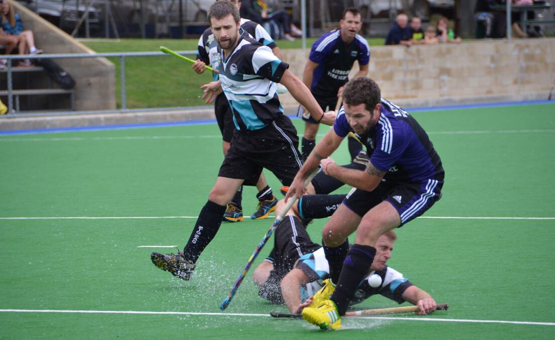 GOAL SCORER: Ziggies' Ben Kelly put his body on the line in an attempt to stop panthers' Jarrod Cameron.
