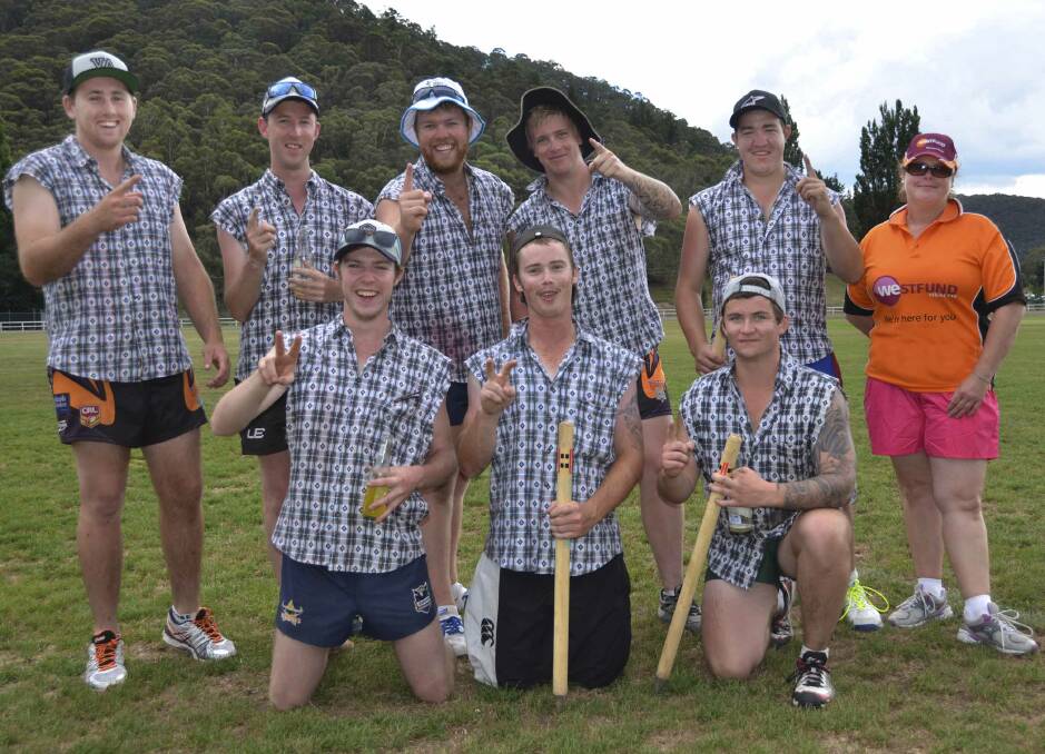 FIRST GRADE CHAMPIONS: Cotton Runts back row from left, Josh Howarth, Chris Giugni, Andrew Fawbert, Ryan Gurney, Chris Redding and daughter of the late Brian ‘Chocko’ Sharp Natalie Sharp;
front, Hayden  Crowder, Dallas Tilley and Ben Sheehan. 	