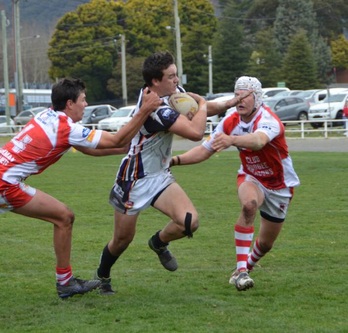 ONE OF THE WOLVES’ BEST: Wayde Egan cuts through the Mudgee defence. 	lm090815wayde