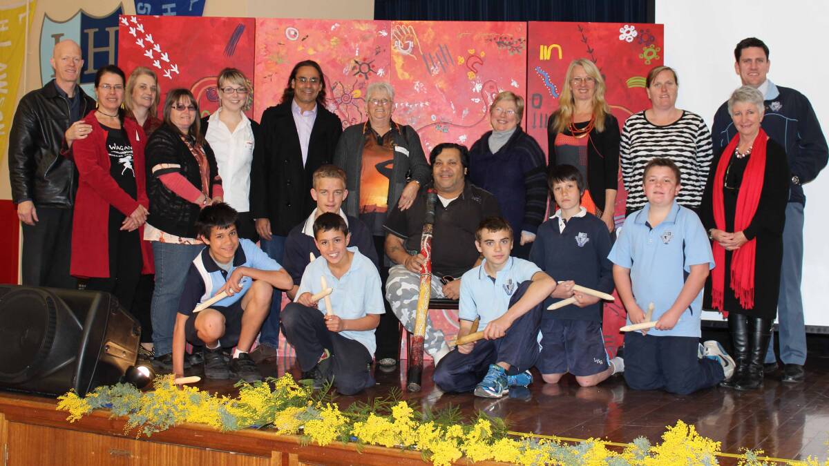 NAIDOC DAY CELEBRATIONS: At back are Norta Norta teacher Mr Russell, Michelle Jacobs, deputy principal Ms Byrne, Annette Campbell, Amanda Smith from Coles, Bernie Hoffmann, Aunty Helen Riley, Bob Sutor, principal Ann Caro, Norta Norta teacher Mrs Galloway, Norta Norta SLSO Kylie Young, Di Moore STLA and relieving deputy principal Mr Quirk; students (in front) Kaleb McKenzie, Joshua Fisher, Ryan Bilby, Tyronne Scaramella-Rowe, Tyler Young and Alexx Conlon. 