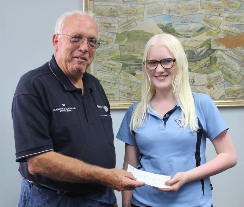 LIONS’ Bill Neubeck presents Alice Kingston with her cheque