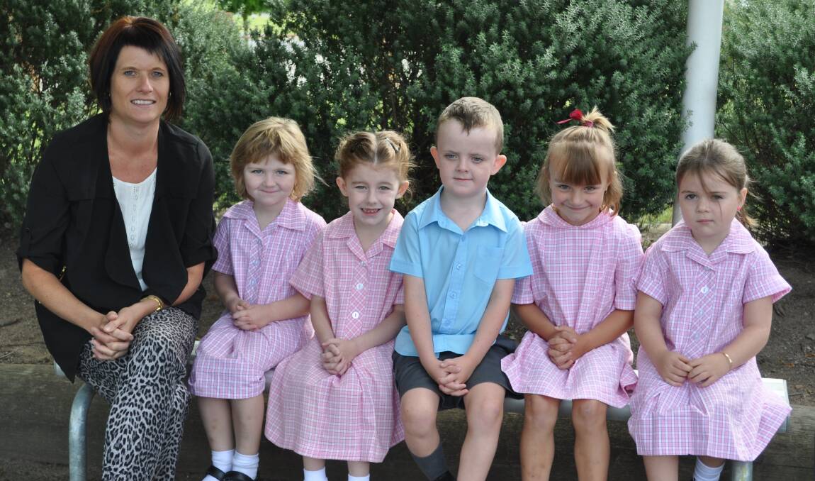 The Kindergarten classes of 2015 were only too happy to oblige when the Lithgow Mercury asked for their best 'say cheese' face and their best 'silly photo' face.