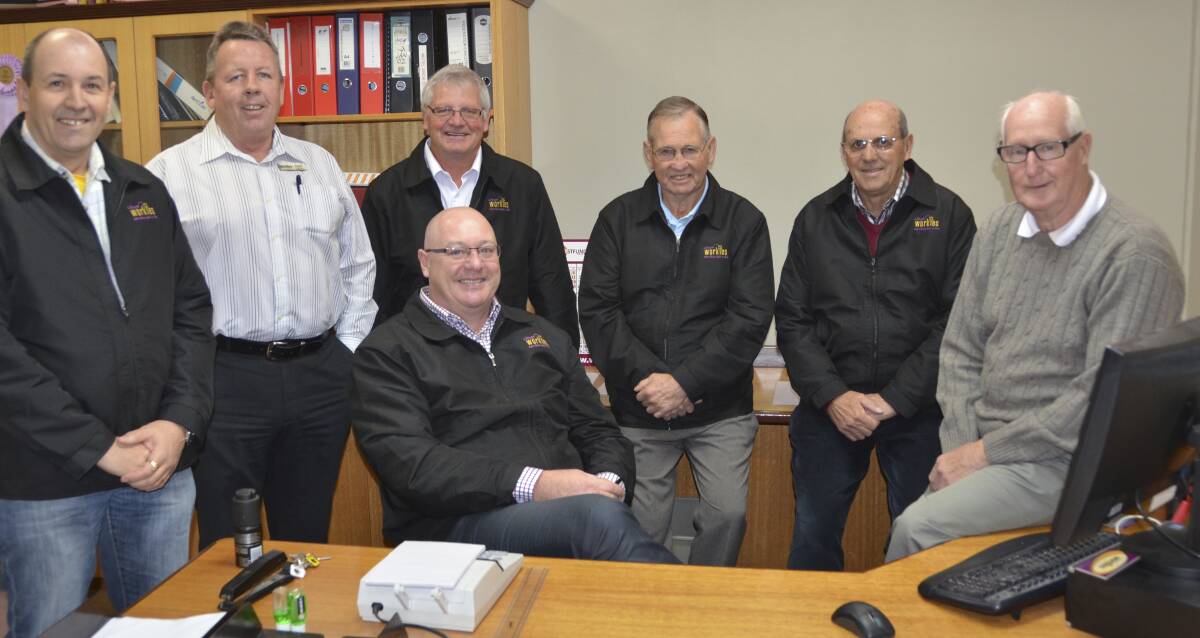 FAREWELL: The Lithgow Workmens Club board gathered yesterday to farewell former manager Michael Alexander/  Seated from left are directors Michael Quinn, newly appointed manager Geoff Wheeler, Trevor Schram, Ray Warren, Peter Quinn and club president Howie Fisher.