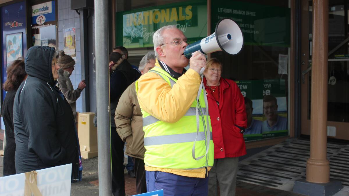 Independent candidate for Calare Anthony Craig protesting outside Andrew Gee's Lithgow office on Monday, June 27. PHOTO: Jacob Gillard.