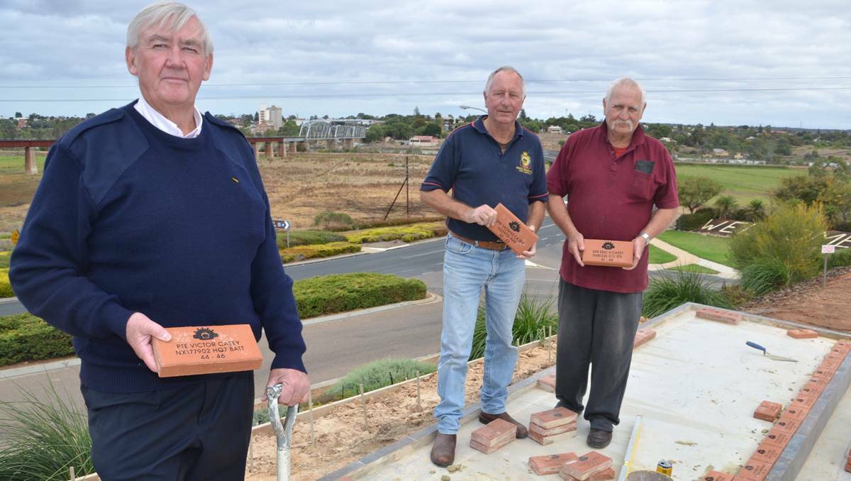 Disgusted: Murray Bridge RSL sub-branch president Ray Duthie, and RSL members John Ali and Peter Tuxford, say plans to unveil a new memorial at Murray Bridge have been ruined by the theft of a World War 1 relic.