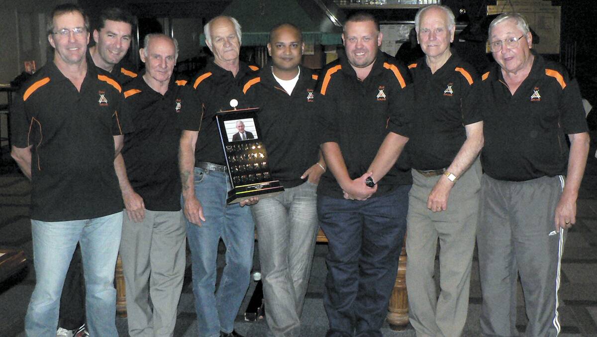 CHAMPIONS: Outlaws from left Peter Warner, Shannon Baer, Michael Andrews, captain Terry Christian, Justin Nelson, Michael Tonkin, Leo Keeley and Cec Thompson. 	lm121513snook