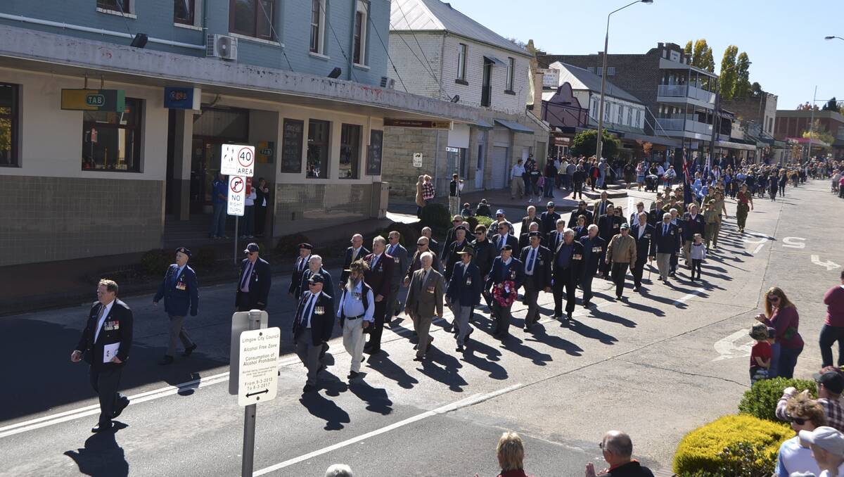 LITHGOW ANZAC DAY: The march is led down Main Street by the veterans