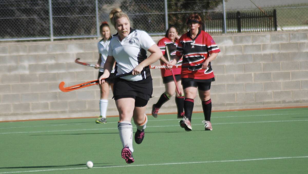 ON THE ATTACK: Zig Zag White’s Emily Foley in action. Photo: JEFF GEDDES 	lm071513emily