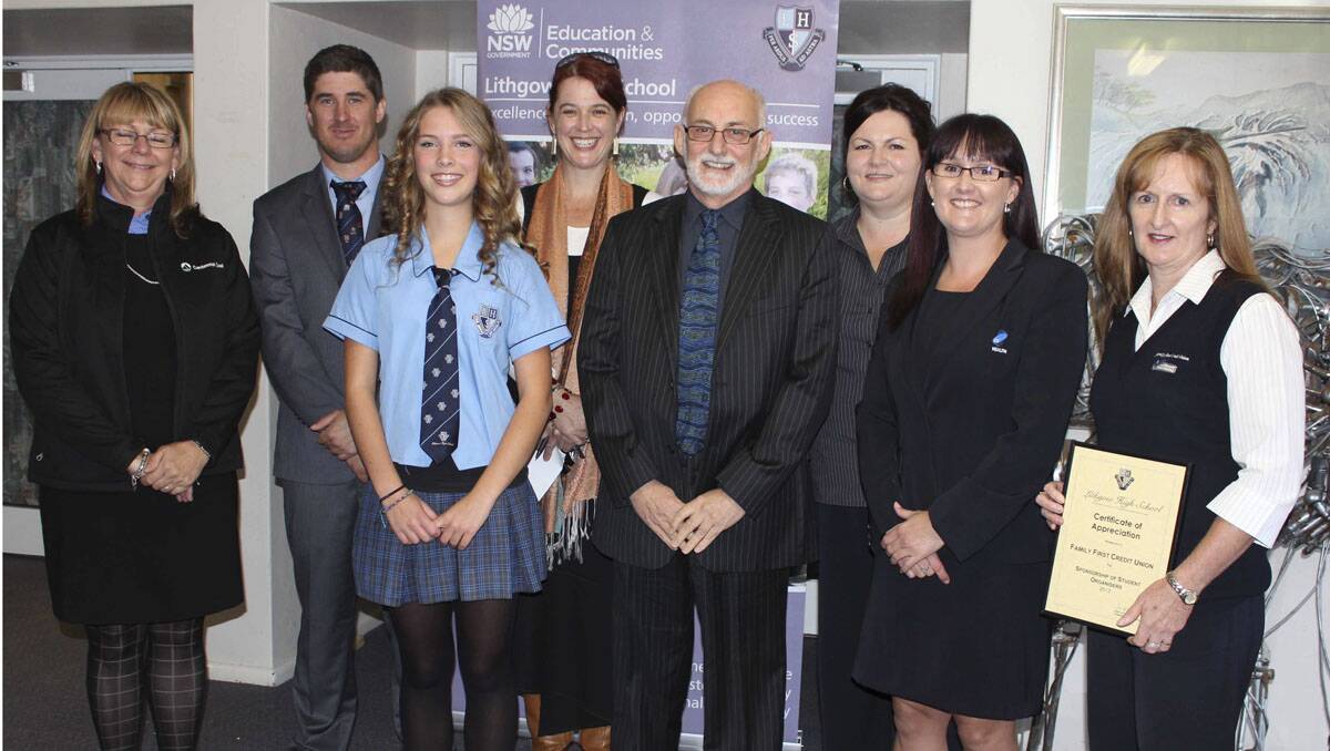 WORTHY PROGRAM: Back from left Sponsors of the rewards scheme and student organisers Janette Jones (Centennial Coal), Lindsay Dunn (Year 7 Adviser ),  Courtney Clarke, Brodie Alexander (Year 8 Adviser ), Andrew Foy (Principal), Ann-Maree Ringin (Westfund ), Belinda Mitchell ( Coal Service's) and Ann Austin (Family First Credit Union).	 lm050913comm