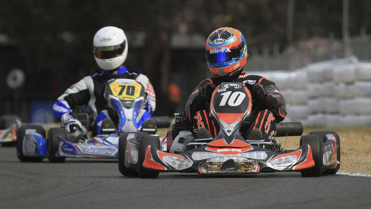 WORTH THE WAIT: Veteran Jason Varley leads Brendan Nelson on his way to victory in the NSW championships. 	lm100713varley
