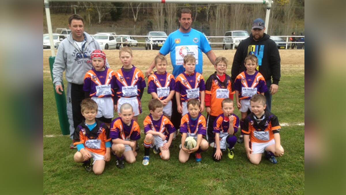 GOOD YEAR FOR STORM UNDER 7: Coaches Shannon Howell, Scott Fittler and Brett Scanlan; back row Aaron Large, Ashton Thompson, Quin Taylor, Blake Fittler, Max Bunting and Tully Howell; front Riley Scanlan, Tyron Schroder, Jaxon Croucher-Bellamy, Stephen Marshall, Jed O’Neill and Noah West. 	lm082713storm