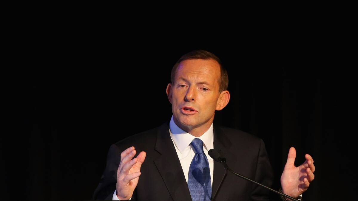  Opposition Leader Tony Abbott addresses the Council of Small Business of Australia forum at the Brisbane Convention & Exhibition Centre on July 25. Photo by Chris Hyde/Getty Images
