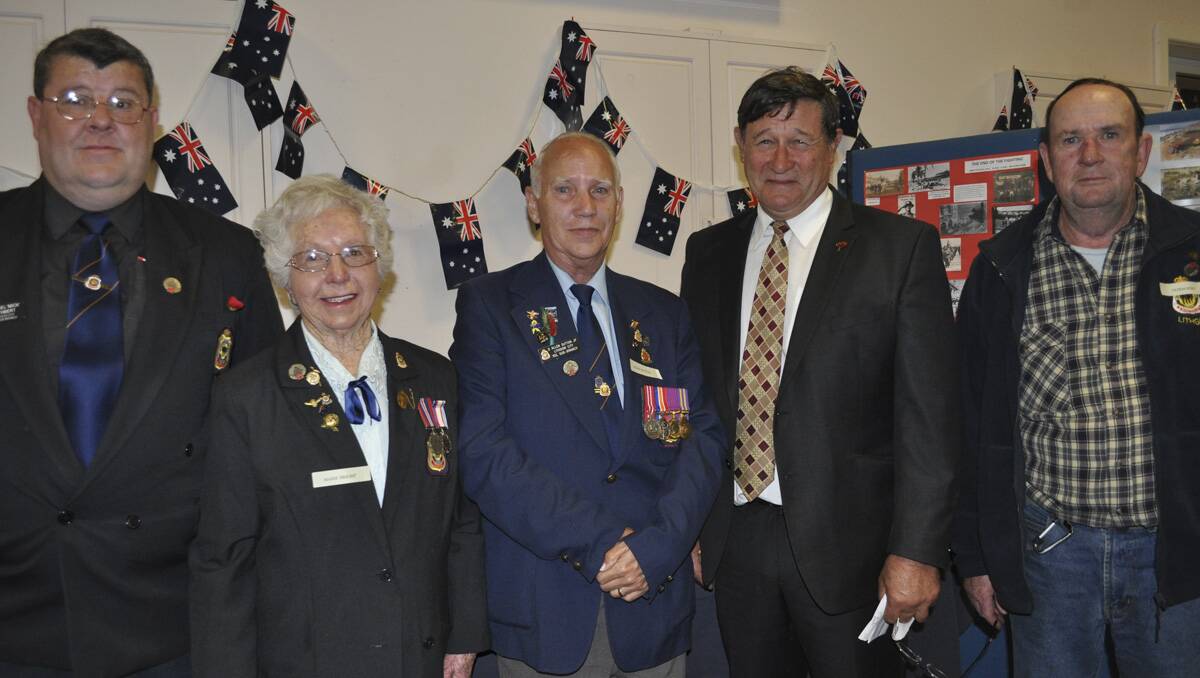 RETURNED SOLDIERS: Michael Cuthbert, Marie Bright, Allen Sutton and Alan Blackett with Member for Calare John Cobb.	