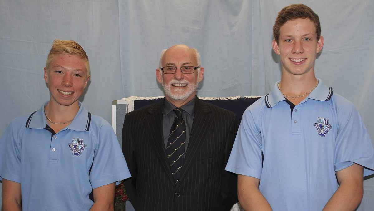 LHS- PRINCIPAL’S MEDALLION: Year 9 Jarrod Pringle and Cameron Denley presented by principal Andrew Foy.