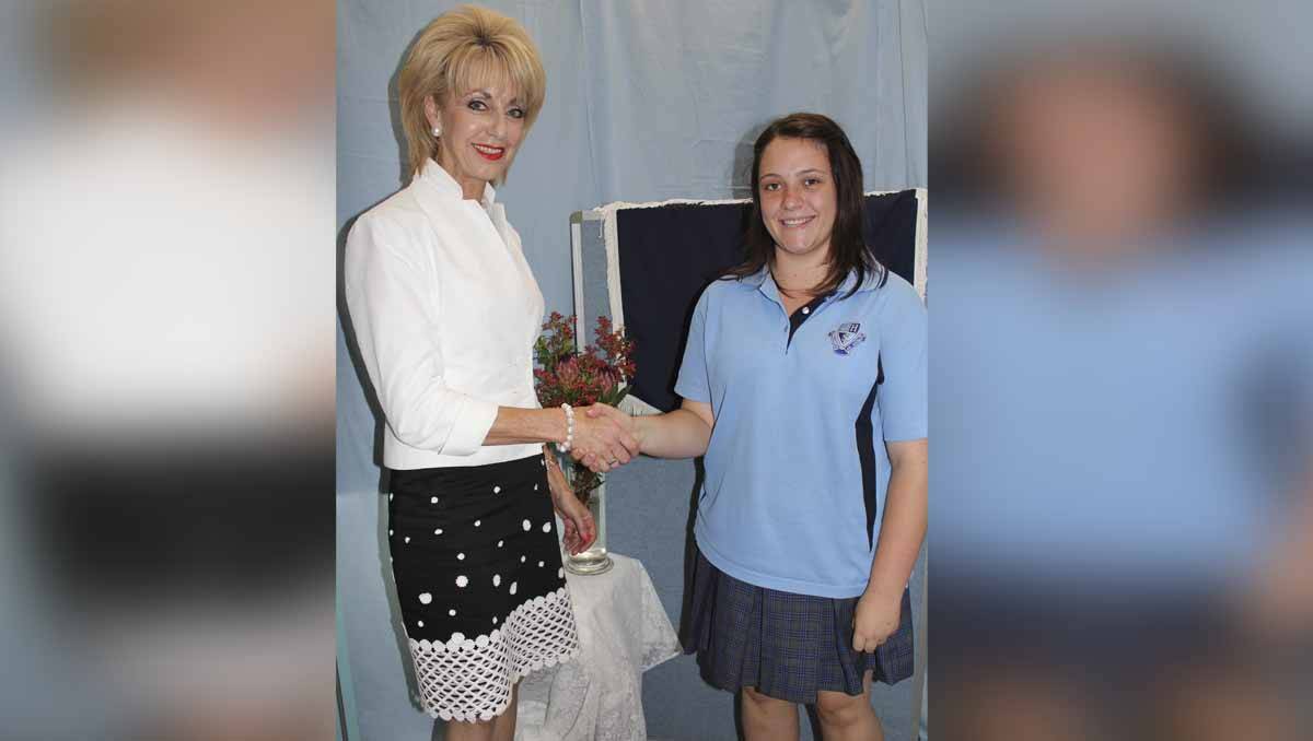 LHS- AUSTRALIAN DEFENCE FORCE AWARD: Year 10 Casey Robson presented by mayor Maree Statham.