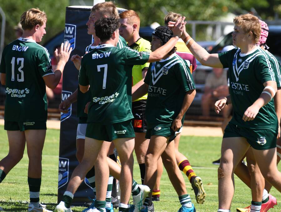 The Western Rams under 16s side celebrate a try. Picture by Jude Keogh