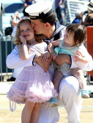 Navy sailor Ben Hinton with daughters Isabelle and Erica. Picture: Supplied