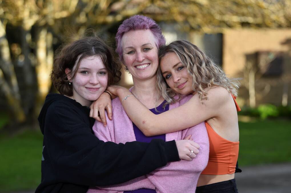 GO PINK: Kate Treacy with her daughters, Tegan and Sasha Treacy. Picture: Lachlan Bence.