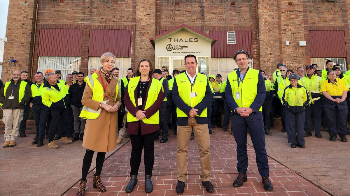 Mayor of Lithgow, Maree Statham, Thales Vice President Land Corry Roberts, Deputy Premier/Member for Bathurst, Paul Toole and Director Integrated weapons and sensors, Matthew Duquemin; Thales with employees. Photo: Reidun Berntsen