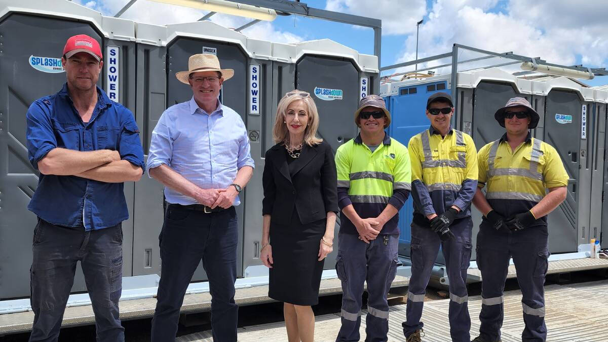 Federal Member for Calare, Andrew Gee, Mayor of Lithgow Maree Statham and workers for the Council at the temporary showers. Picture by Reidun Berntsen. 