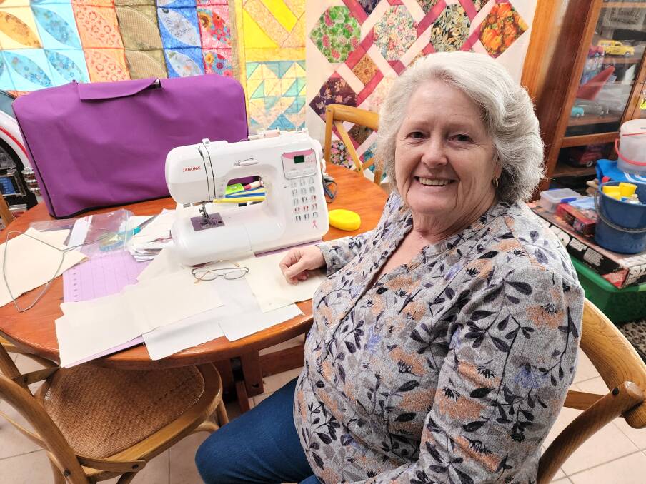 Helen O'Reilly sits with her sewing machine and quilting in the background. Picture by Reidun Berntsen