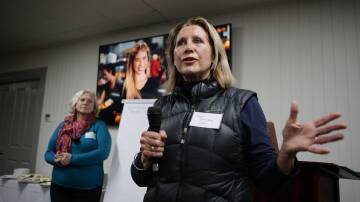 Sharon Howard of the Gang Gang gallery responds to a segment at the Chamber of Commerce information night. Photo: Supplied