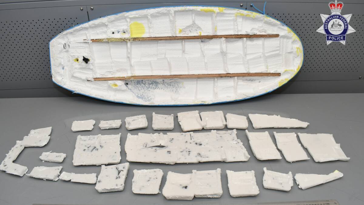 An imported surfboard allegedly packed with meth. Picture via AFP