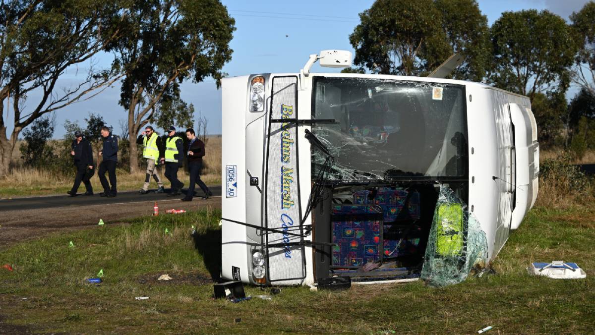Emergency Services at the scene of a bus crash at the intersection of Exford Road and Murphys Road at Eynesbury, in Melbourne. Picture AAP