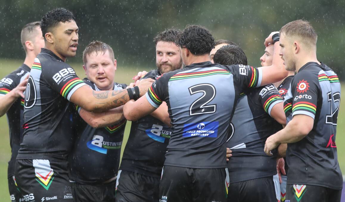Bathurst Panthers celebrate in the rain in a match from the 2023 season. Picture by Phil Blatch