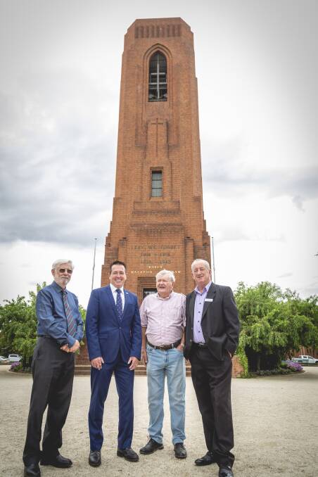 Funding now open: Henry Bialowas, David Mills and Mayor Bobby Bourke with Paul Toole MP at the Bathurst War Memorial Carillon. 