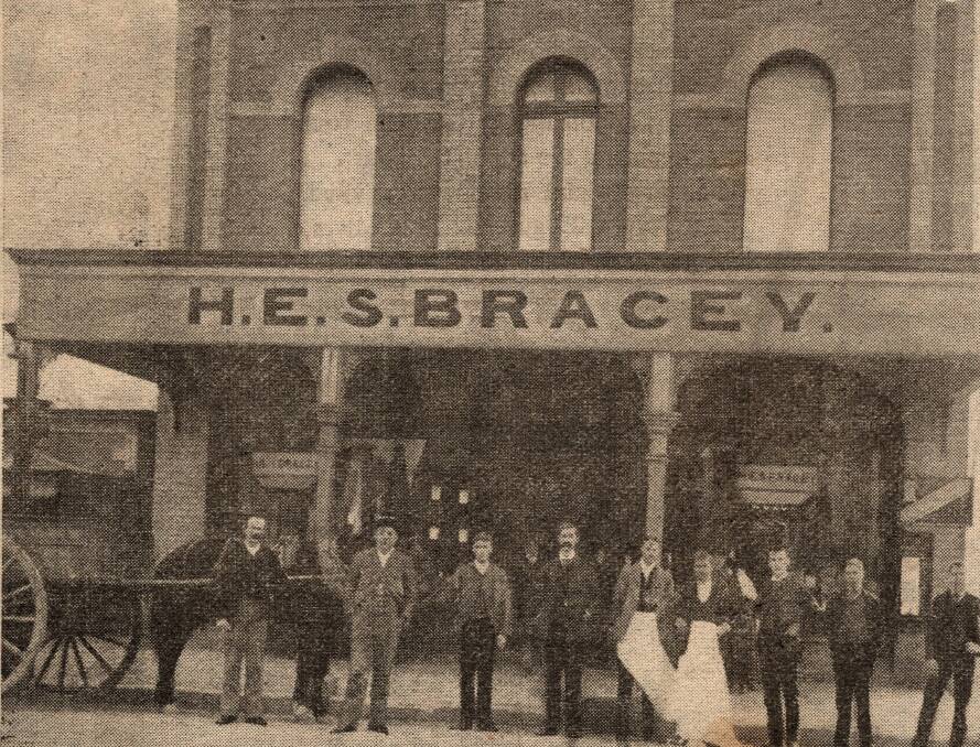 Staff of H.E.S. Bracey 1886 Left to right: A Pugsley, H.E.S. Bracey, J Tougher, J McLoughlin, A Fallick, W Saunders, W Hammond and H Hawkins. Photo: LITHGOW MERCURY 