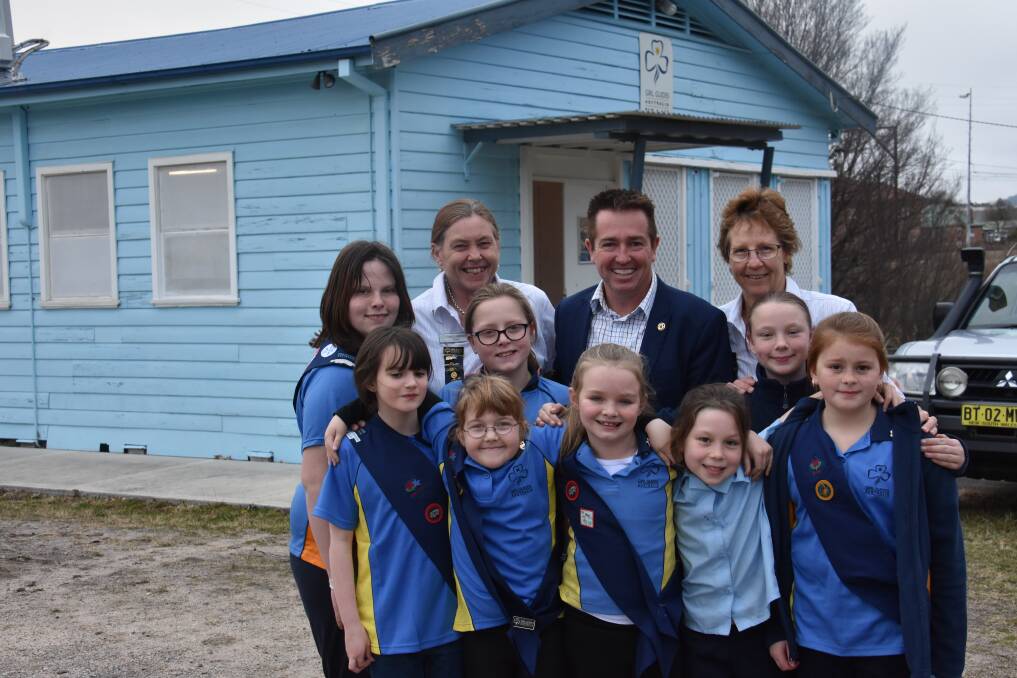 Front: Ashleigh Turrell, June-Maree Mitchell, Izabella Udovcic, Summer Caine, Layla Philipsen. Middle: Samantha Winks, Kayley Winks, Lena Parkes. Back: Leader Francie Laurenson, Bathurst MP Paul Toole and Leader Cheryl Rutherford. Picture: CIARA BASTOW. 