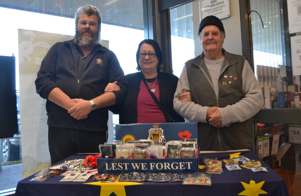 UNITED: Michael Cuthbert with Shannon and Noel Steenhart at their fundraising stall in Lithgow Woolworths. Photo: CIARA BASTOW 