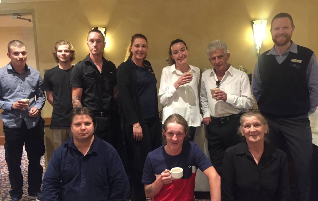 Students gather with Sureway employees and enjoy the coffee's they had been making. Picture: CIARA BASTOW 