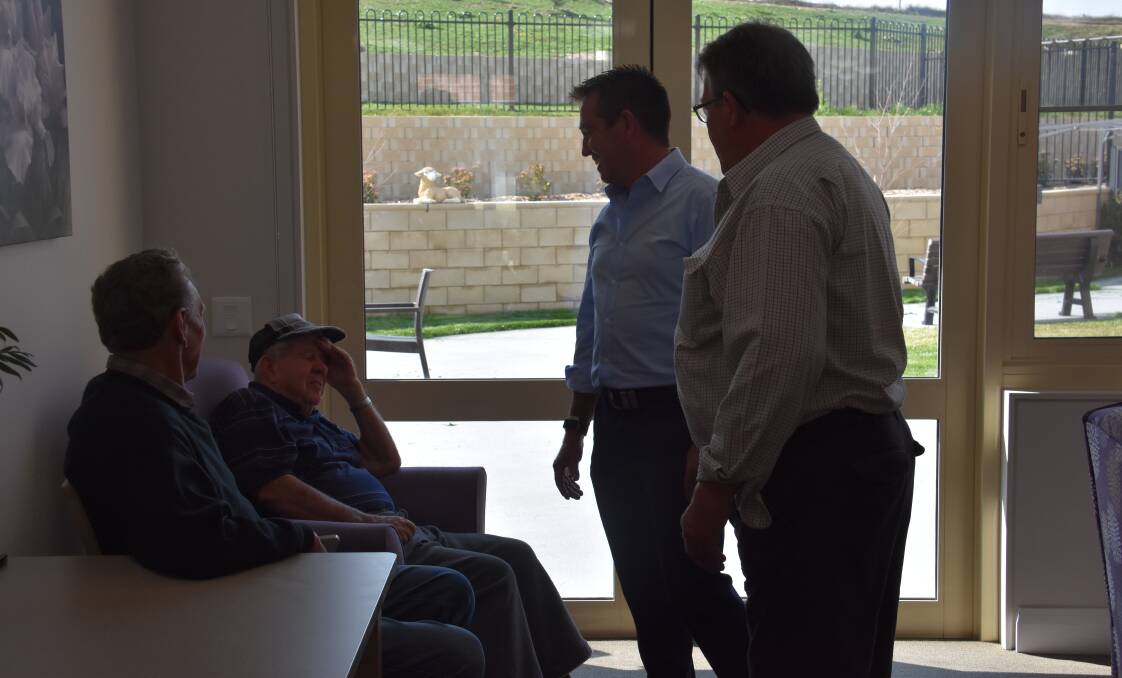 Paul Toole chatting with some of the residents of Melaleuca House. 