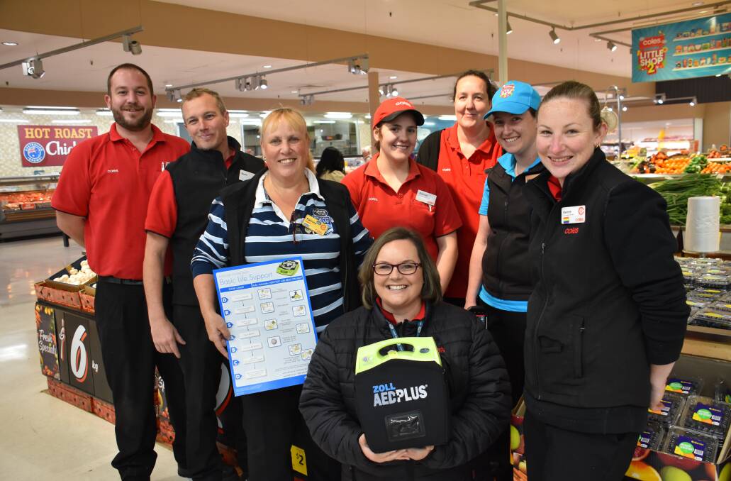 LITHGOW TEAM: Manager Brooke Kinsela with his team of AED trained staff, ready to jump into action when needed. Picture: CIARA BASTOW 