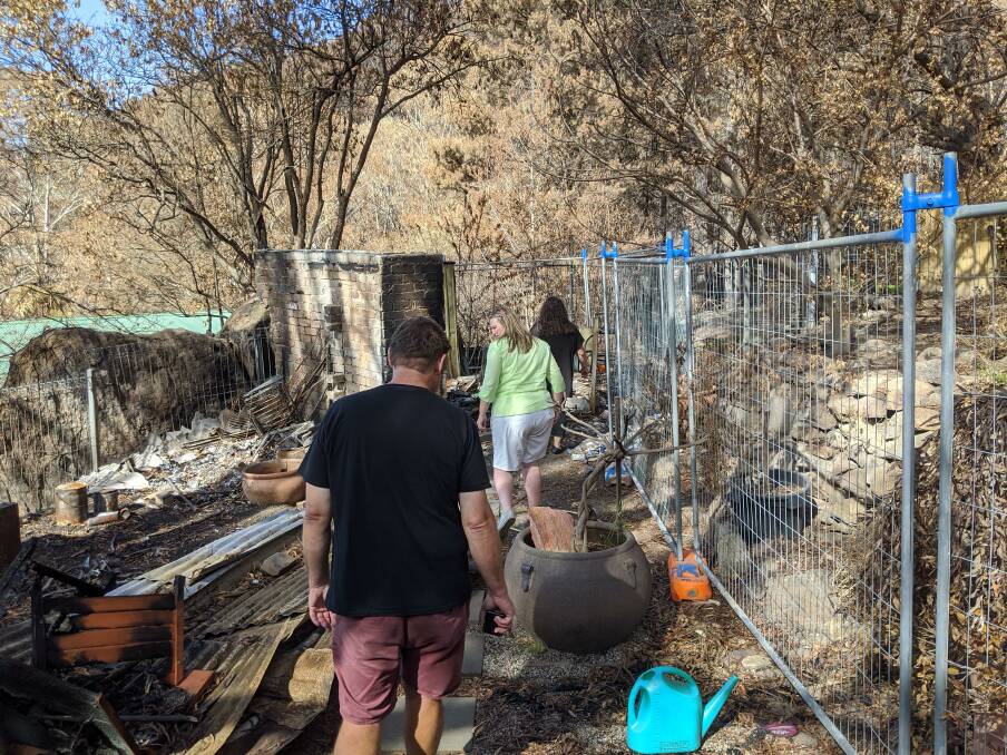 The couple showed Cass the damage the fire did to their property. 