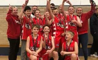 EXCITEMENT: The under 14s boys couldn't contain their excitement after the grand final. Photo: SUPPLIED 