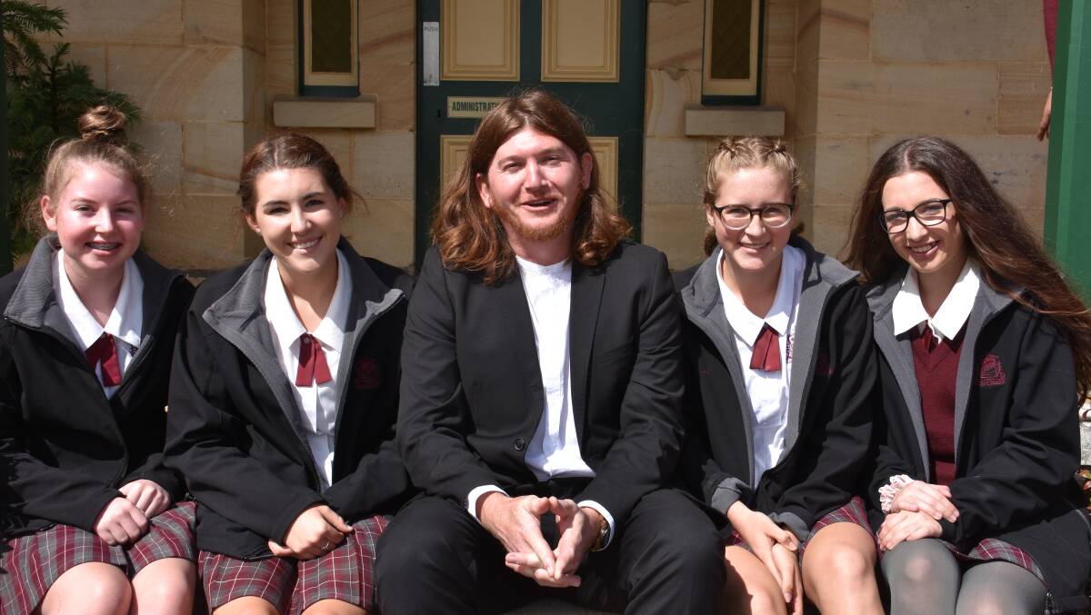 Girls Hannah Whyte, Grace Thompson, Jae Daly and Cassidy Buck with their art teacher (middle)  Mr O'Keeffe. Picture: CIARA BASTOW
