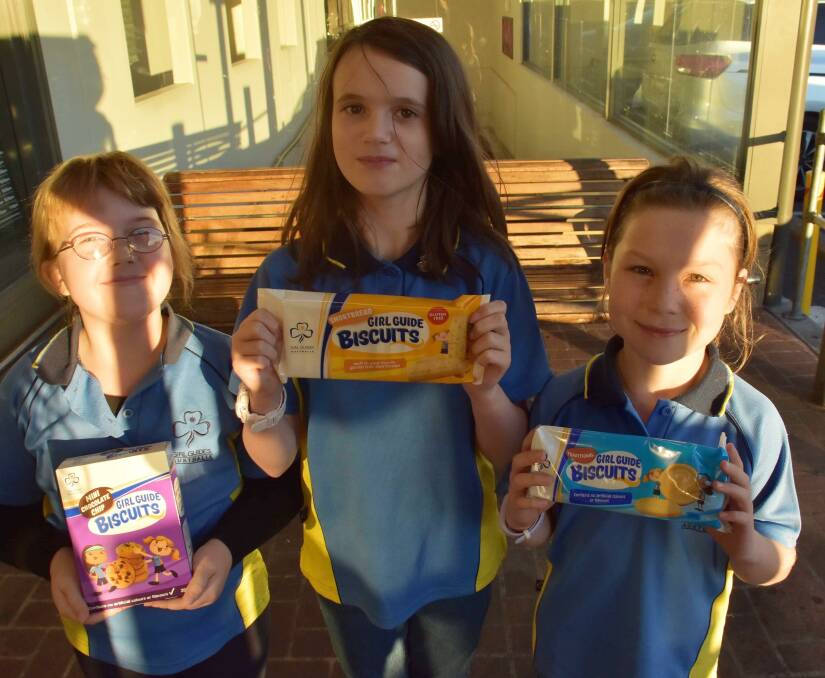 BISCUITS: June-Maree Mitchell, Ashleigh Turrell and Summer Caine showcase the different biscuits on offer. 