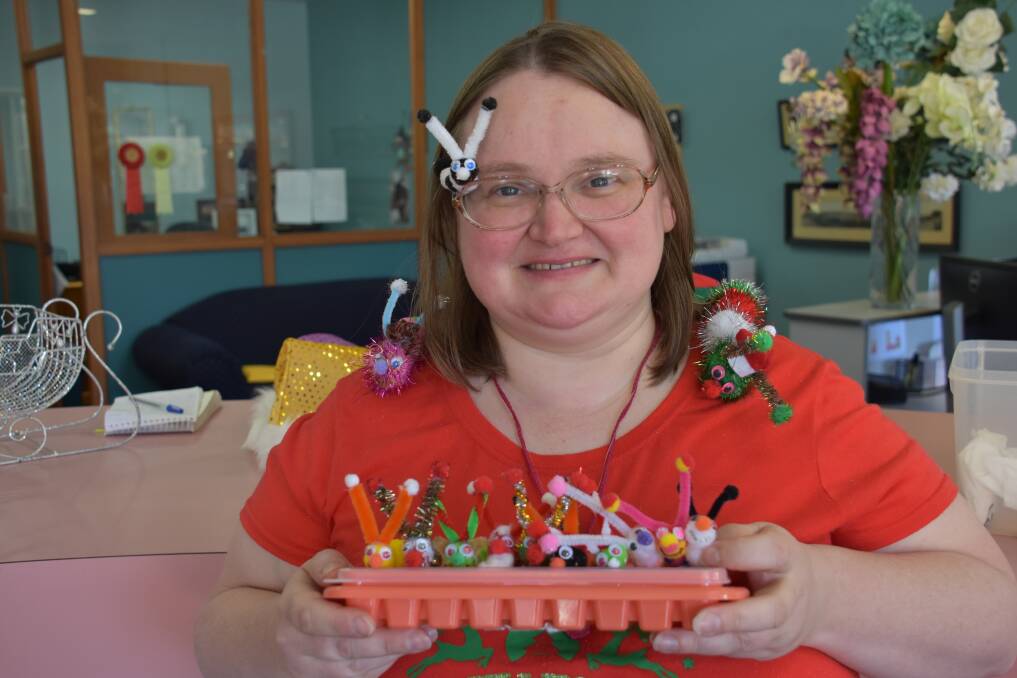 HAPPINESS: Karen Stone shows off her 'TV bugs' that she has been creating. Picture: CIARA BASTOW 