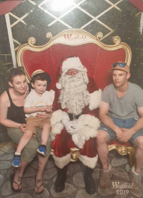 TOGETHER: Angel with her first son, Santa and partner. Picture: SUPPLIED 