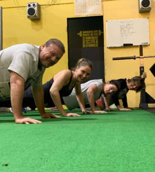 PUSH POPS: Adam Croal, Katie Wright, Donna Lowry and Karen Judge came together to do their push ups. Pictures: SUPPLIED 