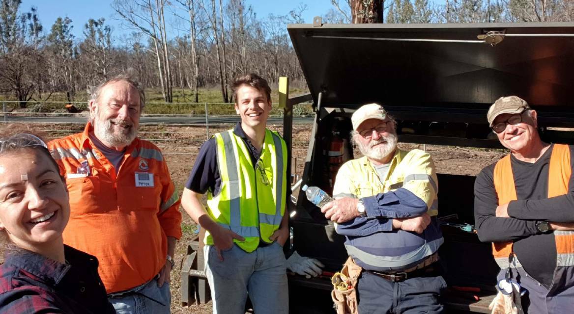 VOLUNTEERS: The BlazeAid volunteers down at Running Stream helping mend fences for those after the bushfires earlier this year. Picture: SUPPLIED 