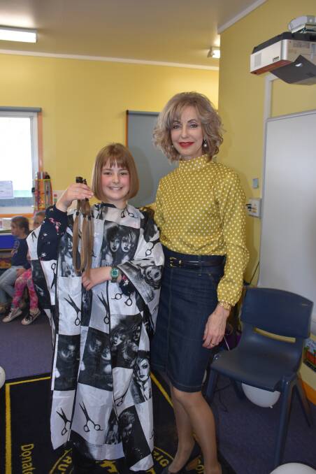 LOCKS: Charlotte Peterson with hairdresser and Lithgow City Councillor Maree Statham. Picture: CIARA BASTOW. 