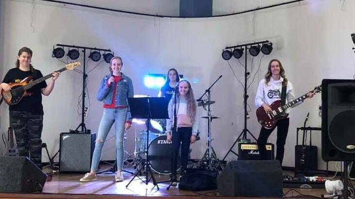 TOGETHER: Hollow Point Band members Patrick, Tess, Nina, Evie and Jack Sheather. Photo: SUPPLIED 